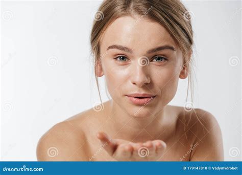 Beauty Portrait Of Young Blonde Half Naked Woman Blowing Air Kiss Stock