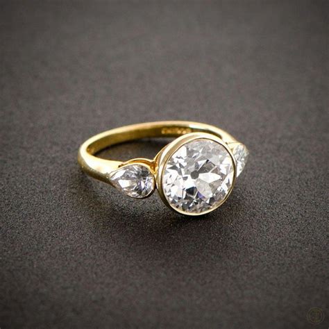 A Stunning English Vintage Engagement Ring Bezel Set In A Beautiful Yellow Gold Estate