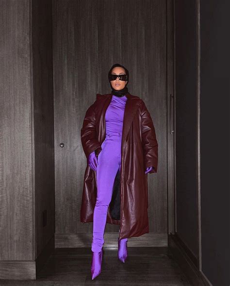 kim kardashian shows curves in skintight purple catsuit as she turns 41 days after sister