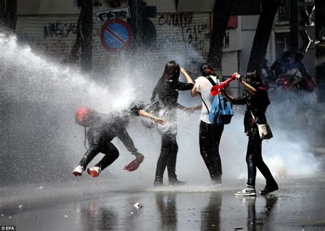 Turkey Protests Horrifying Image Of Woman In Red Being Doused With Pepper Spray Becomes