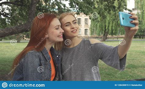 Two Girls Taking A Selfie Outdoors Stock Image Image Of Lips Relax
