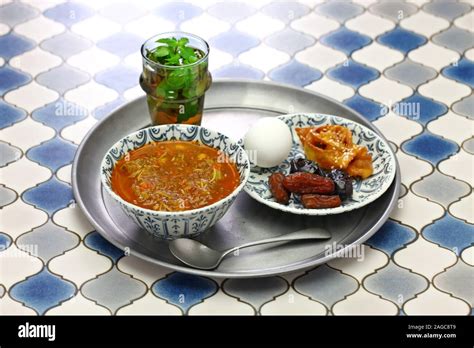 Moroccan Ramadan Iftar Meal Harira Soup Chebakia Dates Mint Tea And