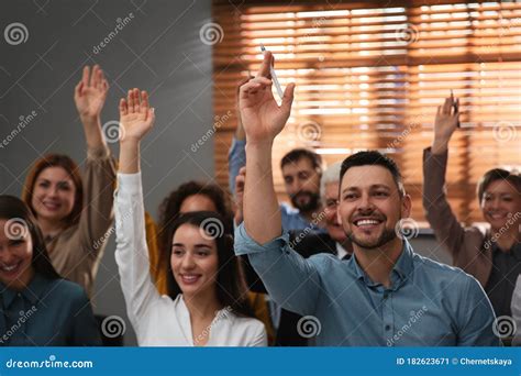 People Raising Hands To Ask Questions At Seminar Stock Image Image Of