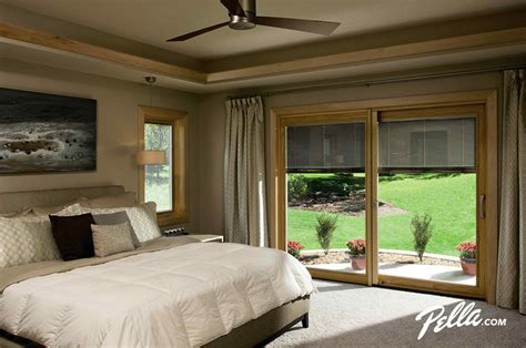 The functional advantage of sliding wardrobe doors is they don't stick out when open. Pella® Designer Series® sliding patio door - Contemporary ...