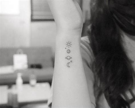 Minimalist Astronomy Symbols Tattoo On Wrist