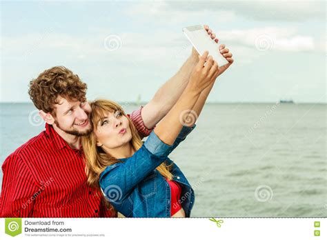 Young Couple Taking Self Picture Selfie With Tablet Stock Image Image Of Websurfing Beach
