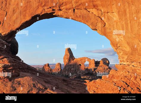 Turret Arch Seen Through The North Window Arch At Sunrise In Arches