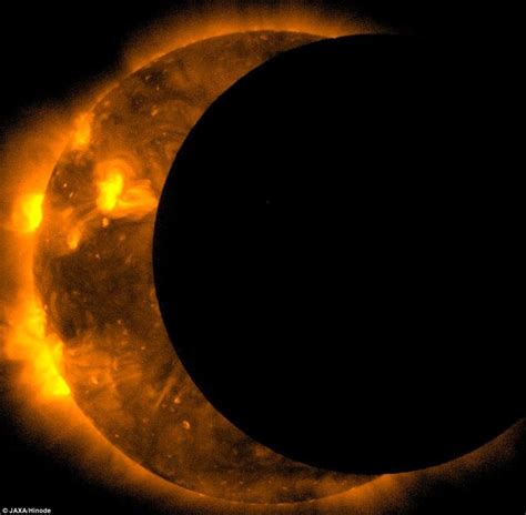 The Solar Eclipse As It Passes Through The Suns Atmosphere In This