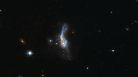 Hubble Photos Reveal Galaxies Colliding Wired Uk
