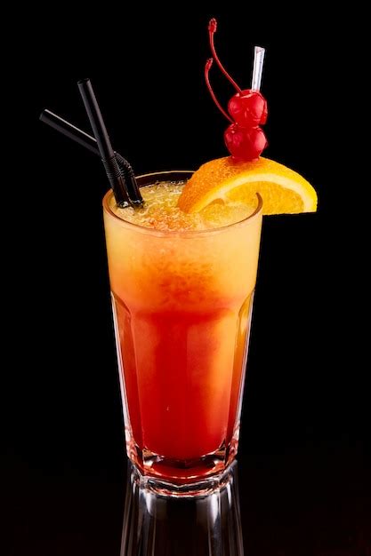 Free Photo Exotic Cocktail With Orange And Cherry