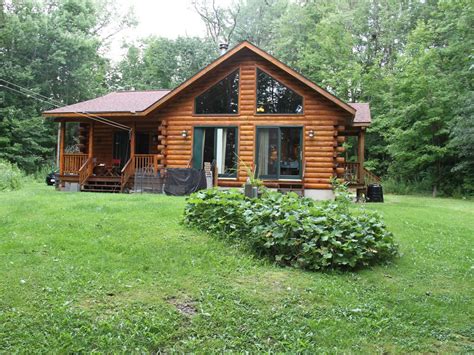 A Beautiful Log Cabin In The Woods On A Lake Pontoosuc Yet Near