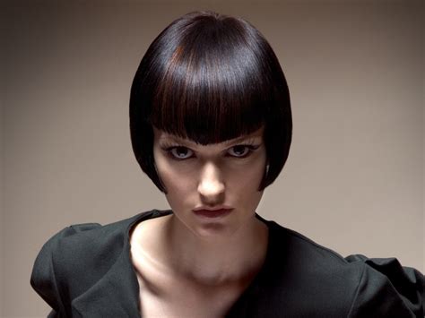 Short Sleek Bob Hairstyle With With Sides That Curve Inward