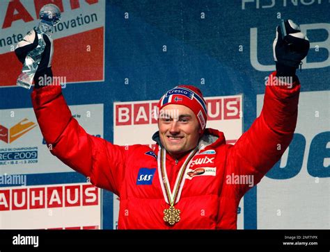 Norways Gold Medal Winner Petter Northug Reacts During The Medal