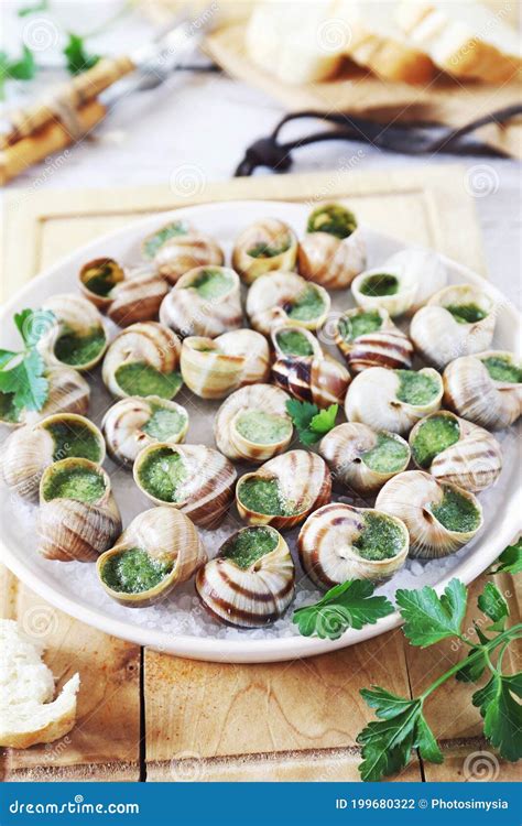 Escargots Traditional French Cuisine Snails With Sauce Burgundy And