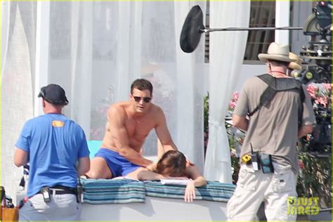 Shirtless Jamie Dornan Bikini Clad Dakota Johnson Film Fifty Shades Beach Scene Photo