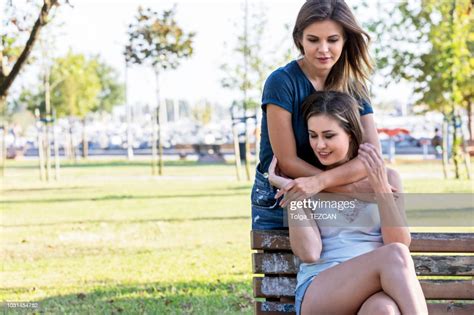 Beautiful Young Lesbian Couple Posing Together Outdoors High Res Stock