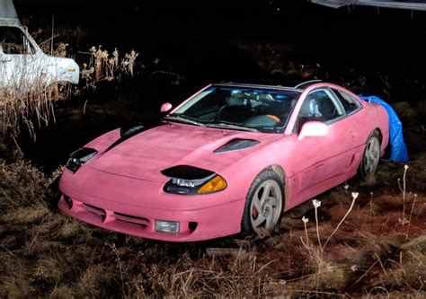 Pink 93’ Dodge Stealth used for the cover of the album ‘Pink Season’ by
