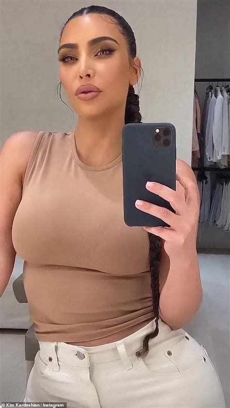kim kardashian goes braless as she puts her famous curves on display in nude tank top artofit