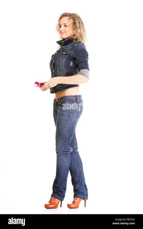 Beautiful Young Woman Blonde Standing Full Body In Jeans Isolated Stock