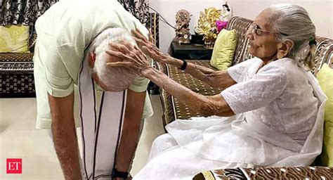 Modi Gandhinagar Pm Modi Takes Blessing From His Mother Heeraben At Her Residence The