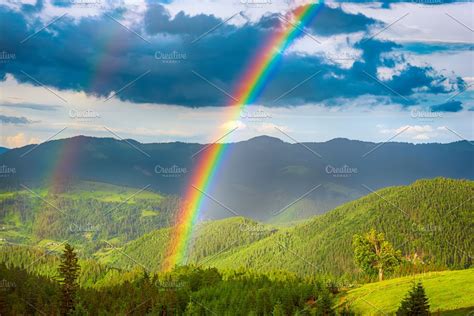 Mountains And Rainbow Featuring Rainbow Mountain And Landscape High