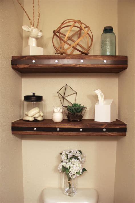 These walnut floating shelves will look magnificent in a small bathroom, and they will provide you with. DIY Floating Shelves with Faux Rivets