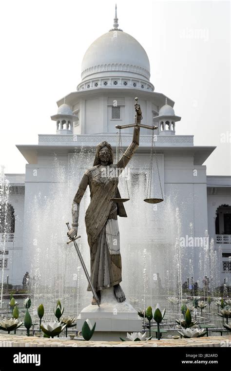 A Lady Justice Statue Stands In Front Of The Supreme Court Complex In Dhaka Bangladesh On