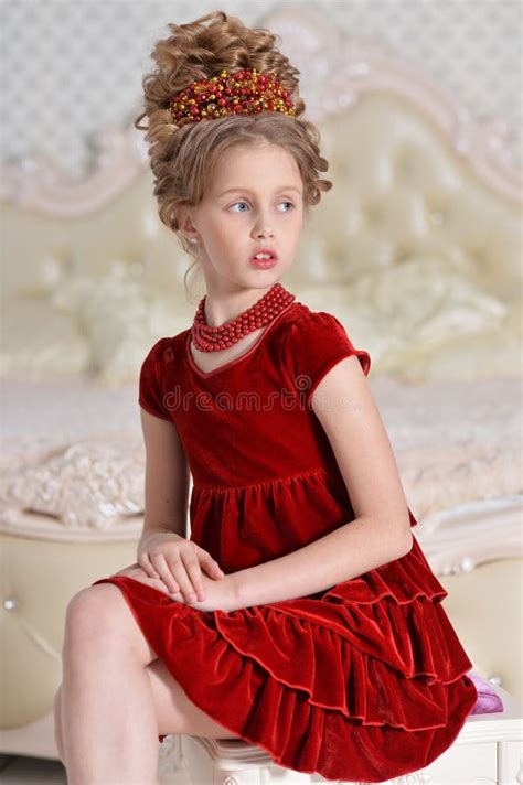 Full Length Portrait Of Girl In Red Dress Posing Isolated Stock Image