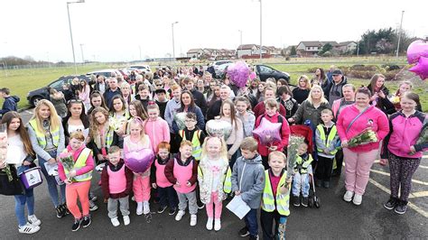 paige doherty memorial sees hundreds turn out wearing pink clothing and releasing heart shaped