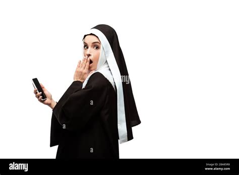 Beautiful Surprised Nun Using Smartphone Isolated On White Stock Photo Alamy