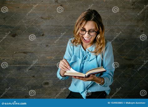 Laughing Woman In Eyeglasses Reading Interesting Book Stock Image Image Of Businesswoman