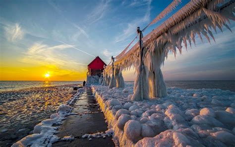 Lighthouses Engulfed By Ice After Winter Storm In Michigan In Pictures