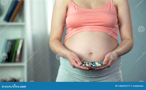 Woman Holding Pills And Additives Unhealthy Pregnancy Risk Of Side