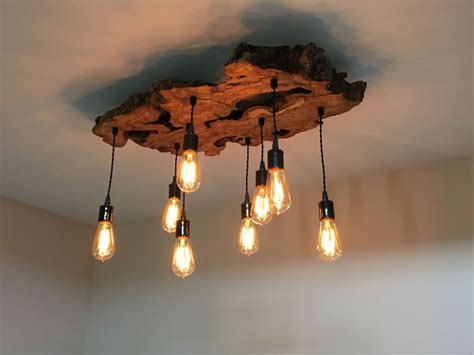 Interior lightning has turned into a tremendously vast region of businesses because of the amazing strides, which have created in all walks of the life. wooden ceiling hangers at DuckDuckGo | Wood chandelier ...