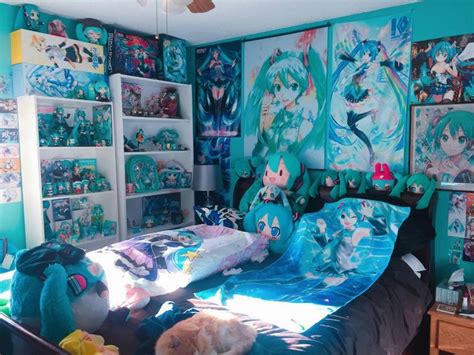 A Bed Room With A Neatly Made Bed And Anime Themed Walls
