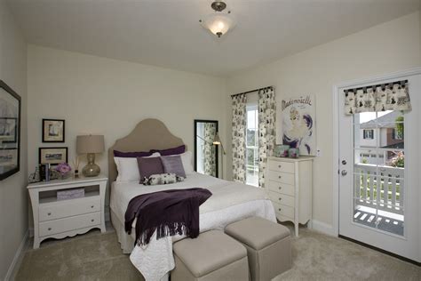 A Bedroom With Balcony Access In The Compass Homes Parade Home Compass Homes Bedroom With