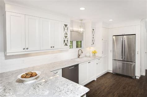 Here are some reasons to consider this dazzling countertop surface. A crisp white kitchen with Cambria quartz Summerhill countertops, vinyl plank flooring and ...