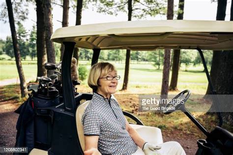 Woman Golf Cart Photos And Premium High Res Pictures Getty Images