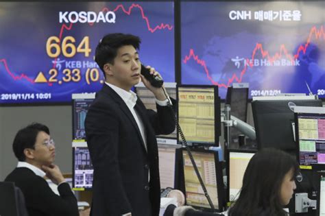 Asian Markets Mixed After Wall Street High Inquirer Business