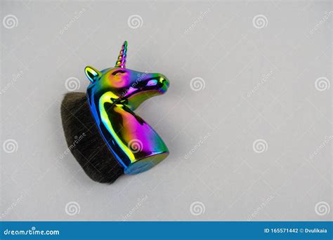 Holographic Unicorn On A Gray Background With Copy Space Stock Photo
