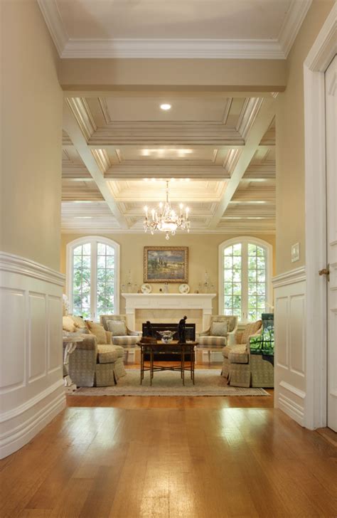 Although coffered ceilings draw the eye upward, the beams extend downward into a room, taking up some overhead space. Coffered Ceilings - Wainscot Solutions, Inc.