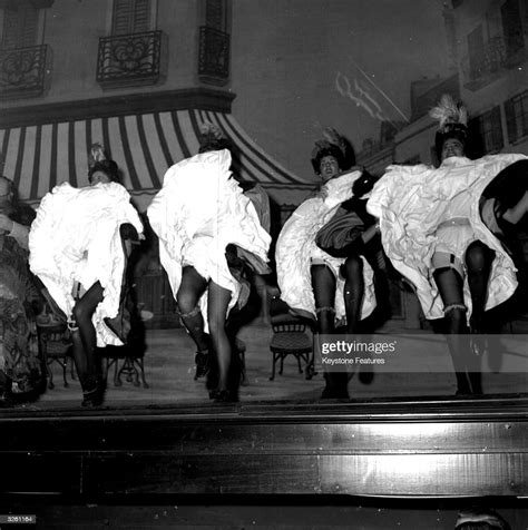 Frilly Skirts Hide The Can Can Dancers Faces During The Production