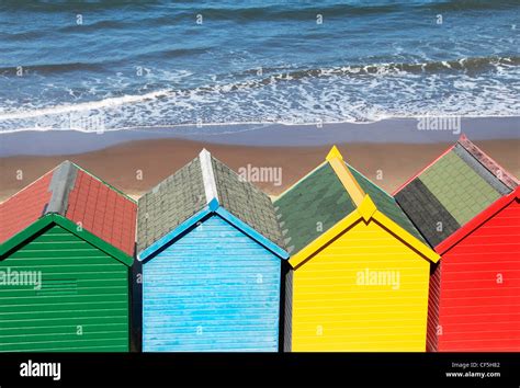 Brightly Coloured Beach Huts Stock Photo Alamy
