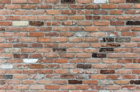 Brown Brick Wall Close Up Photography · Free Stock Photo