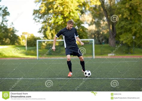 Soccer Player Playing With Ball On Football Field Stock Photo Image