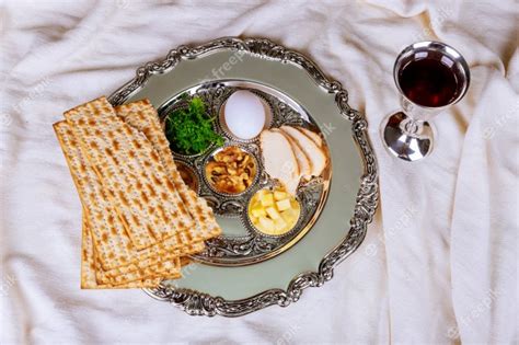 premium photo matzo for passover with seder on plate on table close up