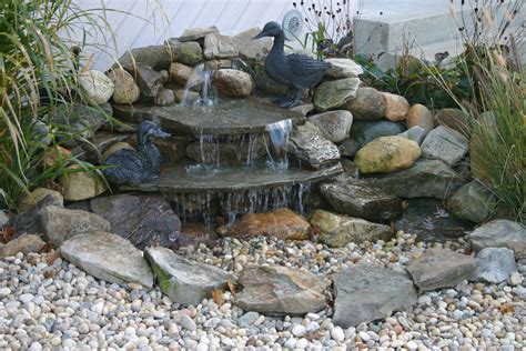 An easy, convenient and affordable way to build a beautiful waterfall in your own backyard. Aesthetically pleasing pondless waterfall #totalpond # ...