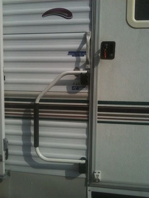 8 slide the escutcheons into place to conceal the mounting screws. Lend-a-Hand Folding Grab Handle for RVs - White Rail with ...