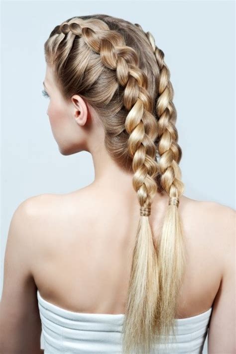 Separate the necessary section with a comb, tie the side sections in two ponytails, spread some hair product along the middle. Two French Braid Hairstyles for Women