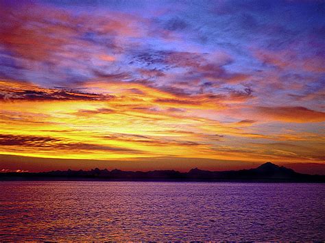 Sunset Over The Ocean Sun Water Island Hd Wallpaper Peakpx